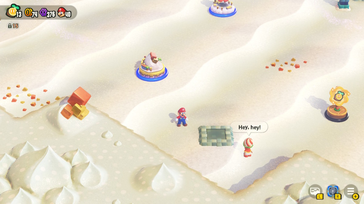One of the switches in the sandy open area of World 4 in Super Mario Bros. Wonder.